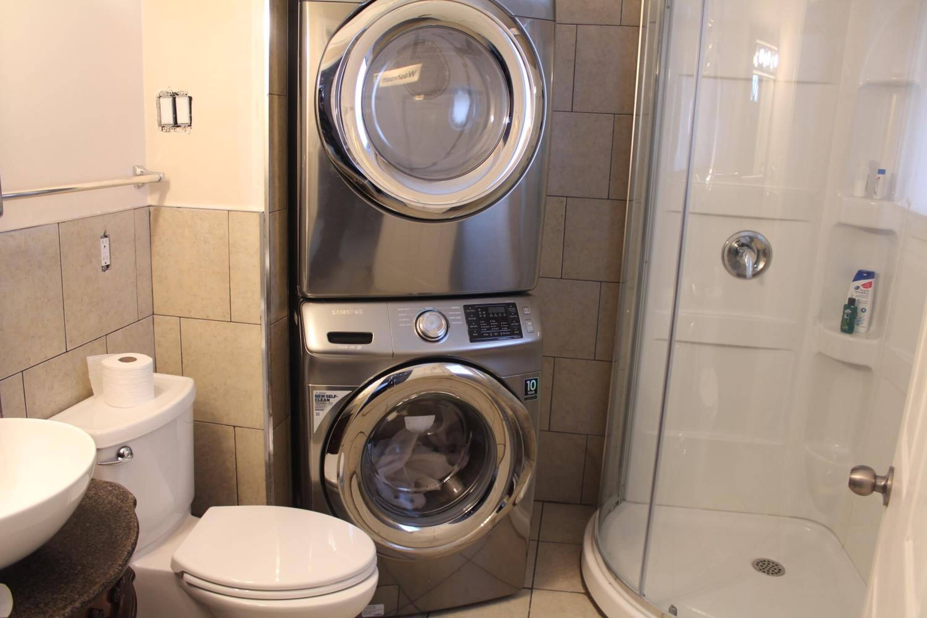Hair dryer, slippers, towels, soap