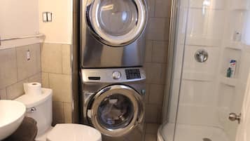 Hair dryer, slippers, towels, soap