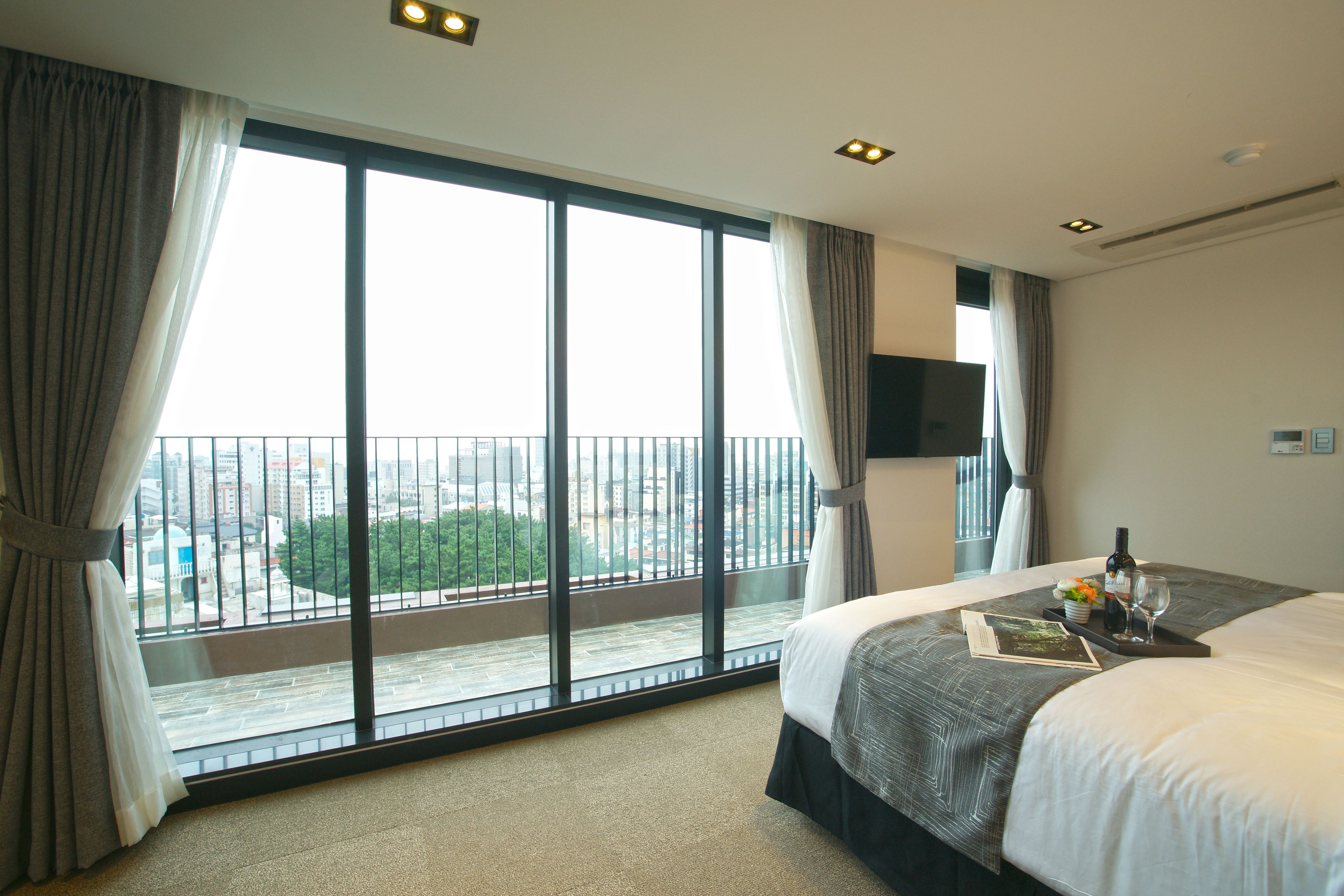 suite | premium bedding, blackout curtains, free wifi, bed sheets