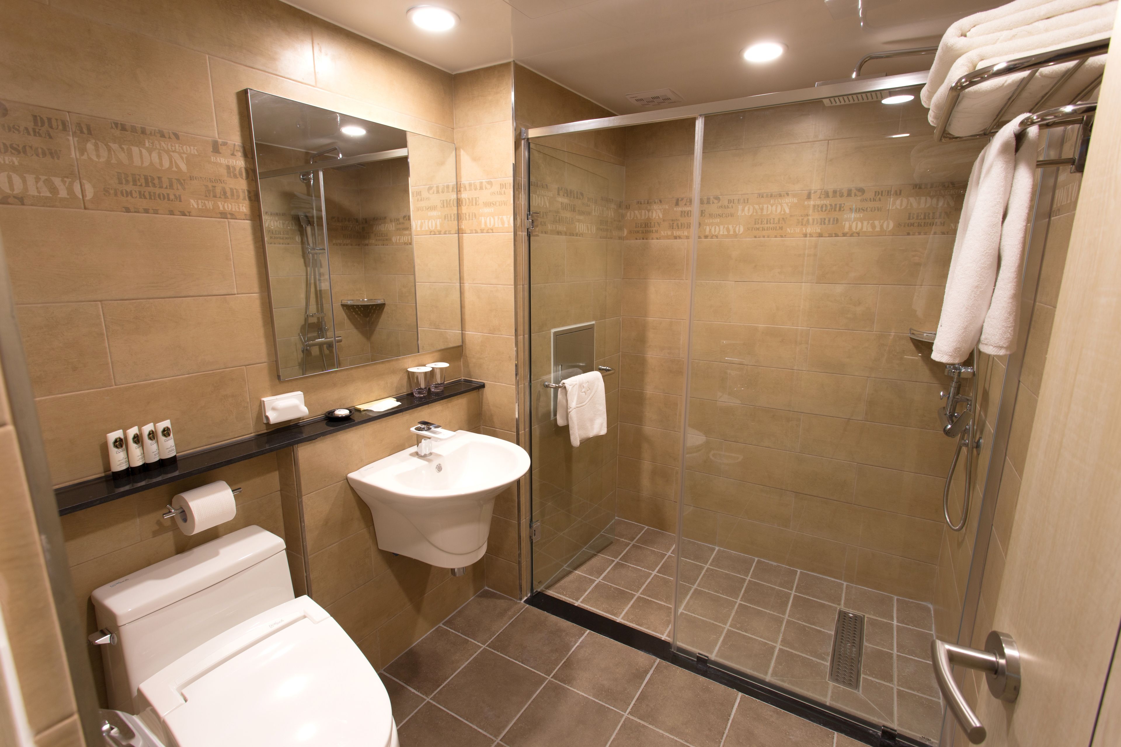 standard room | bathroom | shower, free toiletries, hair dryer, slippers