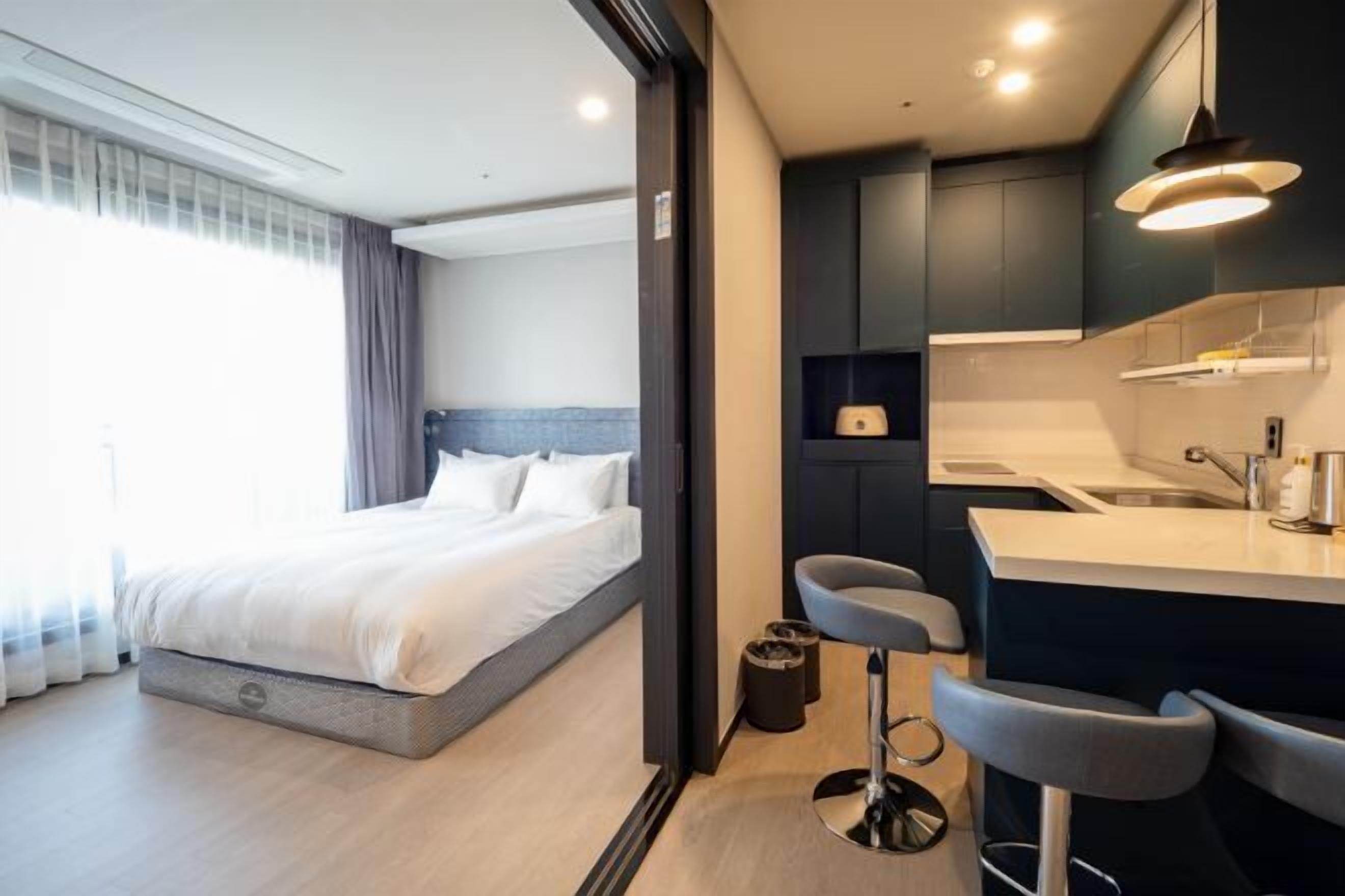 Premium bedding, desk, blackout drapes, soundproofing