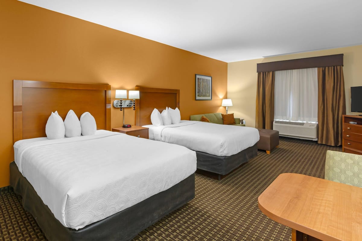 Suite, 2 Queen Beds, Non Smoking | Desk, iron/ironing board, free cribs/infant beds, rollaway beds