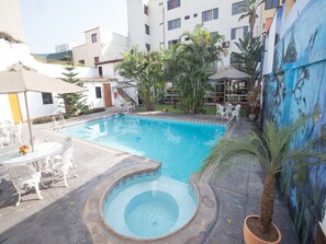 Seasonal outdoor pool, pool umbrellas, sun loungers