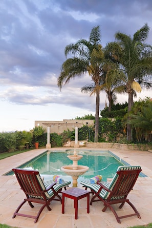 Outdoor pool, pool umbrellas, sun loungers