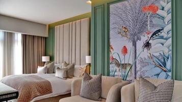 Premium bedding, down comforters, minibar, in-room safe