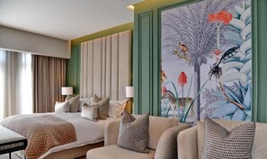 Premium bedding, down comforters, minibar, in-room safe
