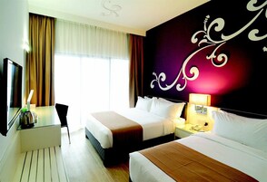 Deluxe Room, Balcony | Minibar, in-room safe, iron/ironing board, free WiFi
