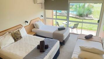 Family Room | Premium bedding, Select Comfort beds, individually furnished, desk