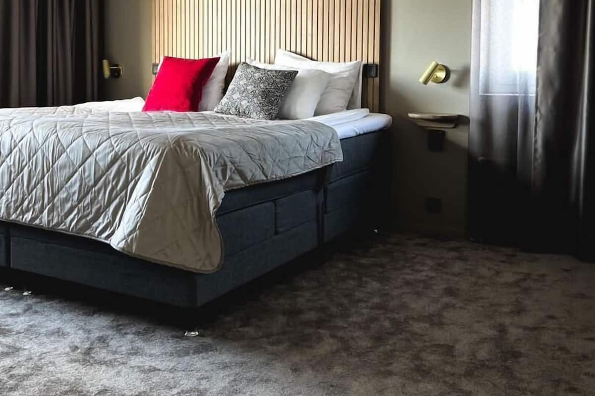Suite, Sauna | 1 bedroom, minibar, in-room safe, iron/ironing board