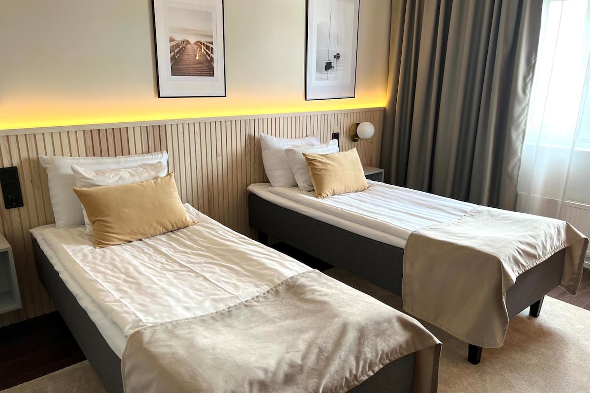 superior twin room | minibar, in-room safe, iron/ironing board, free wifi