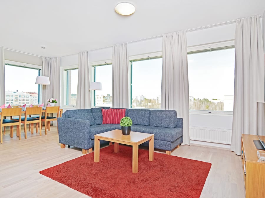 Apartment, 1 Bedroom, Sauna | Living room | Flat-screen TV