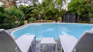 Outdoor pool, open 6:00 AM to 8:00 PM, sun loungers