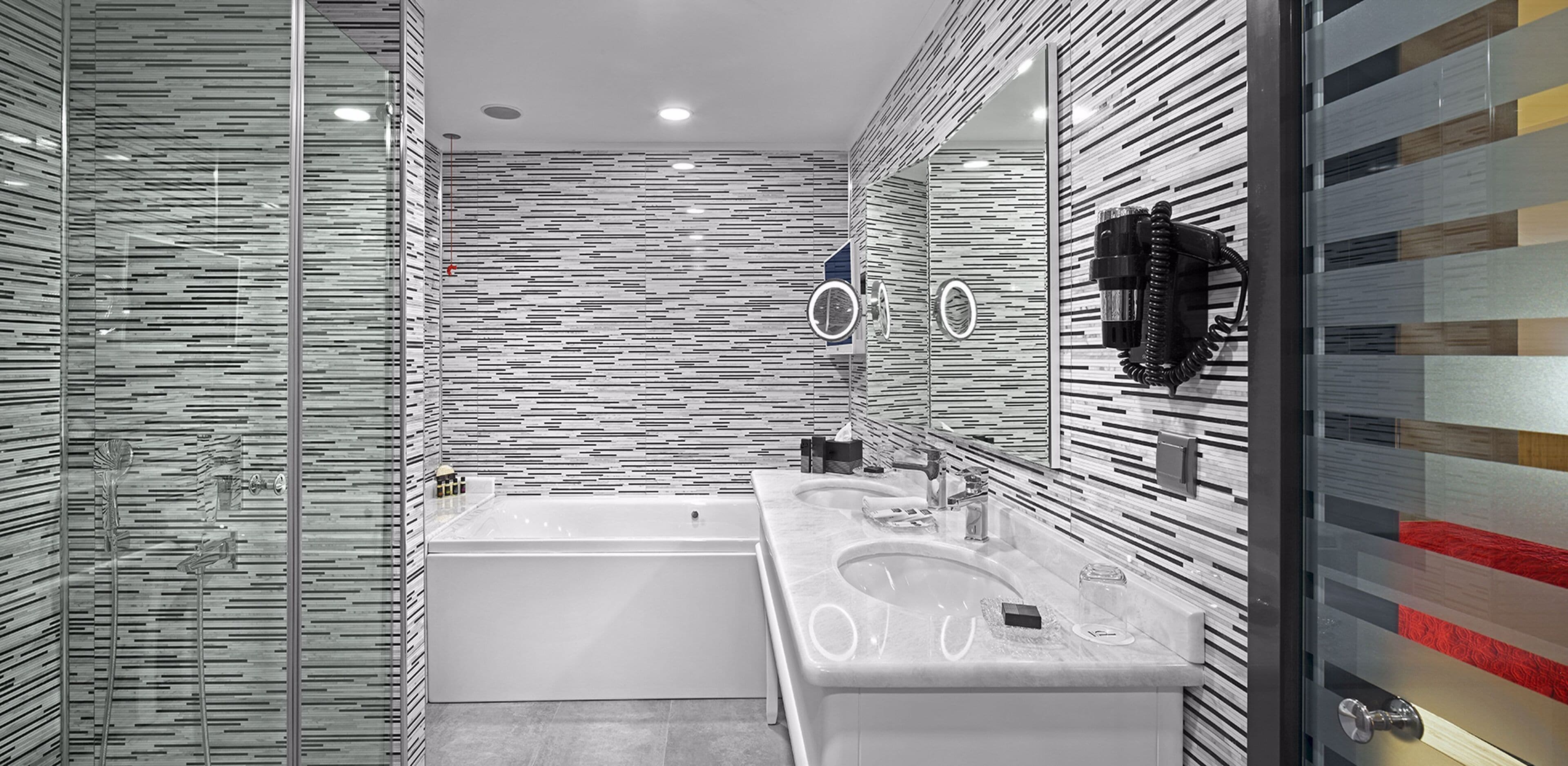 eco-friendly toiletries, hair dryer, slippers, towels