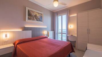 Double Room, Sea View | Minibar, in-room safe, desk, free WiFi