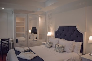 Suite familiale, 2 chambres, vue sur la ville | 1 chambre, literie de qualité, couette en duvet, coffre-fort