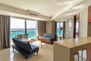 Room, 1 Bedroom, Kitchenette, Ocean View | Living area | 32-inch flat-screen TV with cable channels, TV