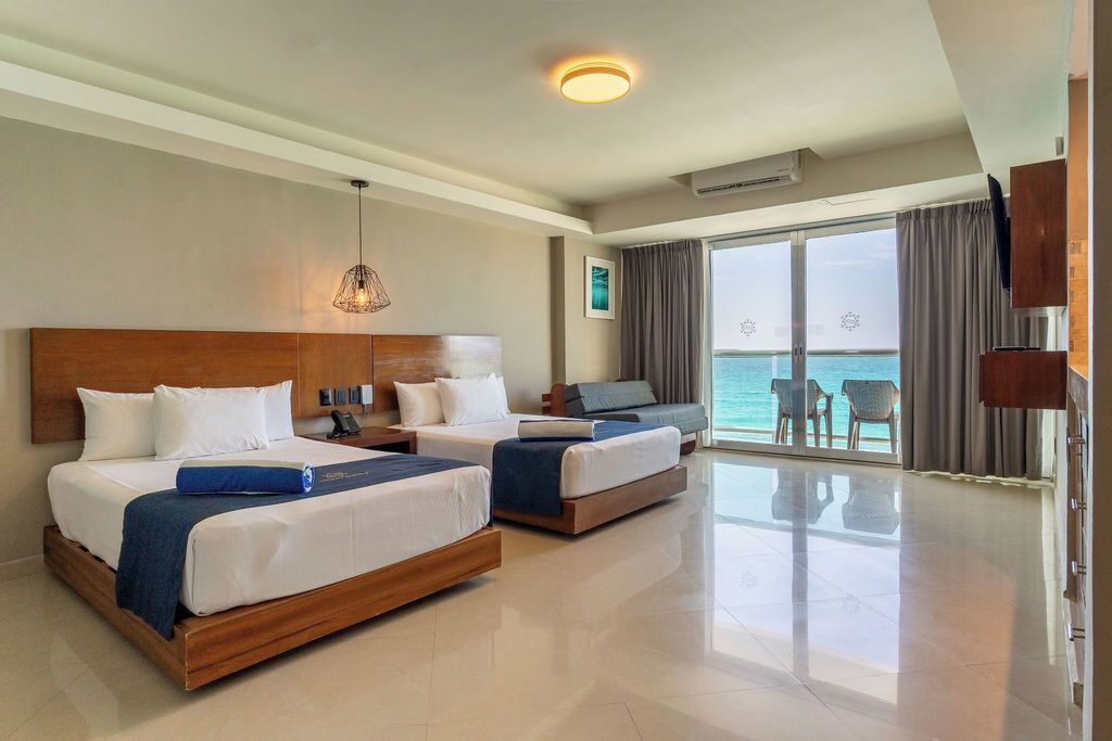 Deluxe Room, 2 Double Beds, Ocean View | In-room safe, blackout drapes, iron/ironing board, free WiFi