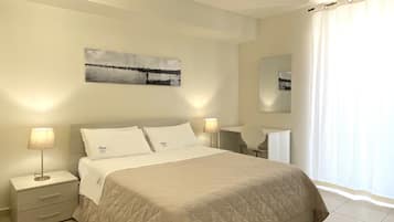 Quadruple Room, City View | In-room safe, soundproofing, free WiFi, bed sheets