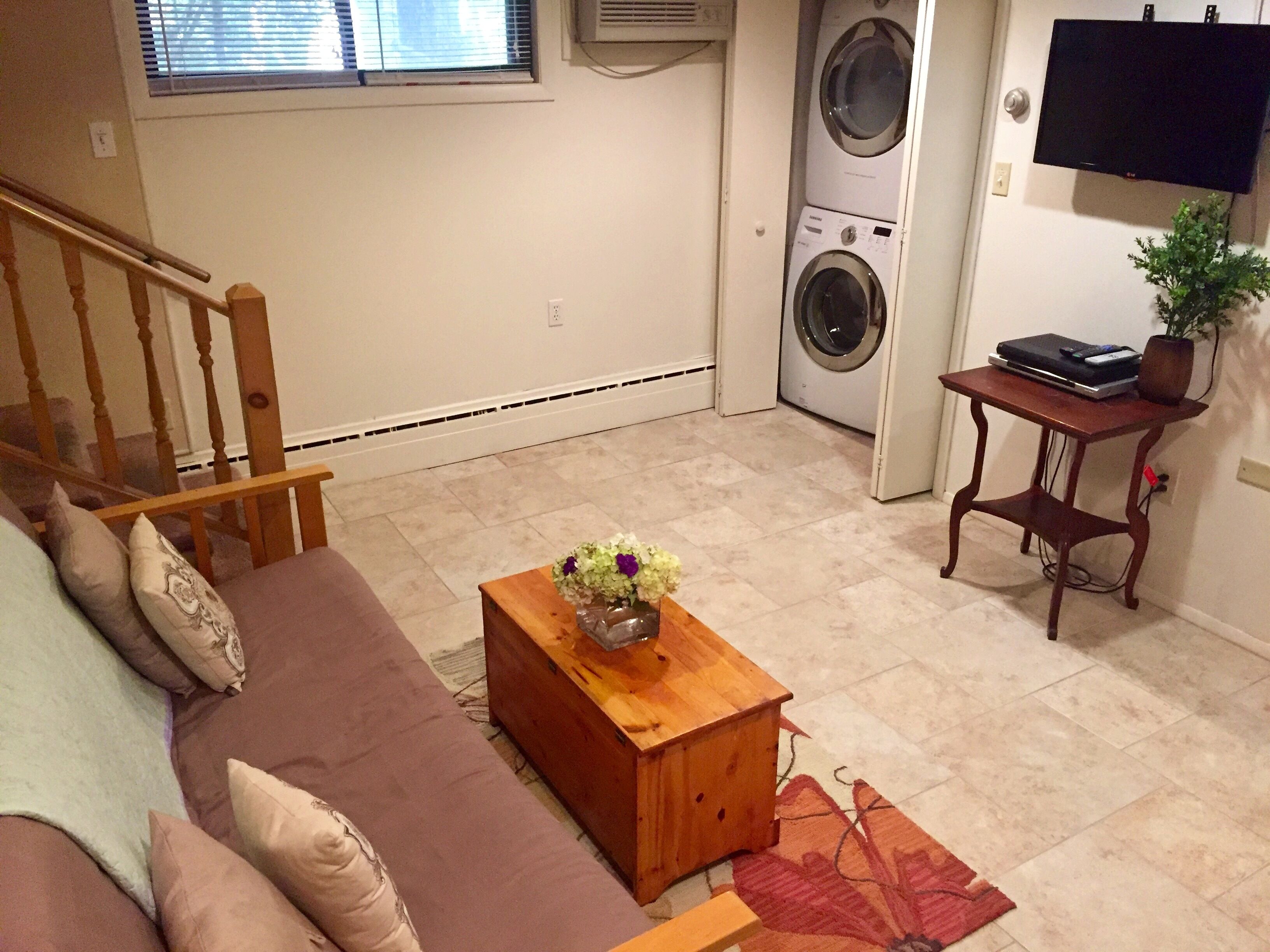 deluxe suite, 3 bedrooms, lake view, lakeside | living area | flat-screen tv