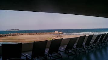 On the beach, beach towels
