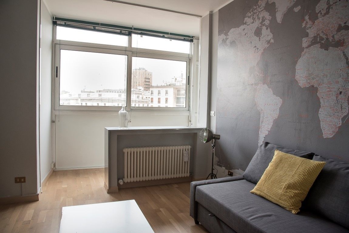 Apartamento, 1 habitación, vistas a la ciudad | Zona de estar | Una televisión de pantalla plana