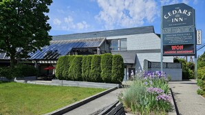 The Cedars Inn with a modern design, solar panels, and a Japanese restaurant. - Cedars Inn Hotel & Convention Center (Gibsons)