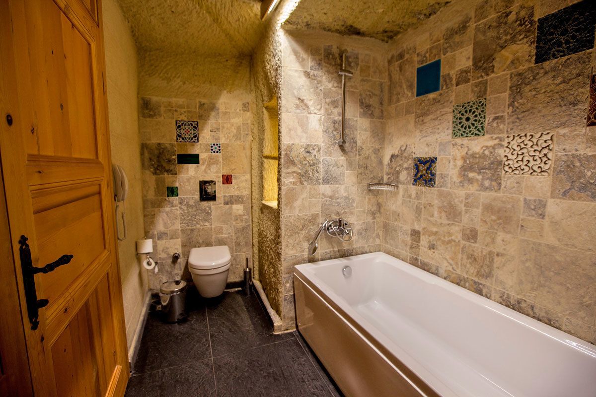 combined shower/bathtub, free toiletries, hair dryer, dressing gowns