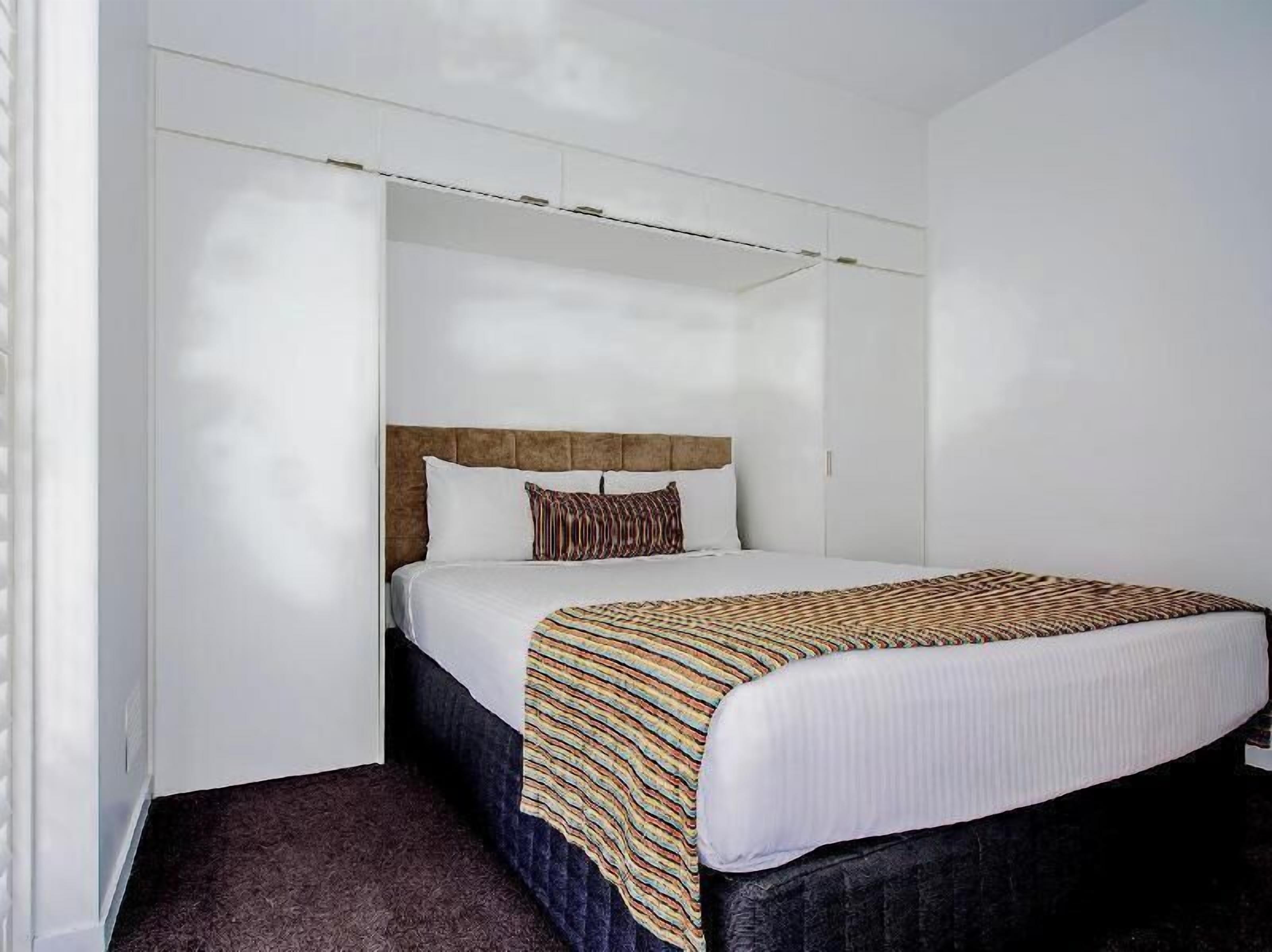Blackout drapes, iron/ironing board, free WiFi, bed sheets