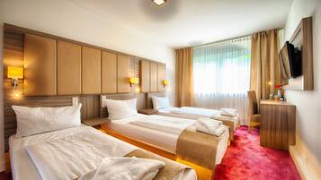 Comfort Triple Room | In-room safe, desk, blackout curtains, soundproofing