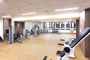 Stay fit on the go with our well-equipped fitness center featuring treadmills, weight machines, and free weights.