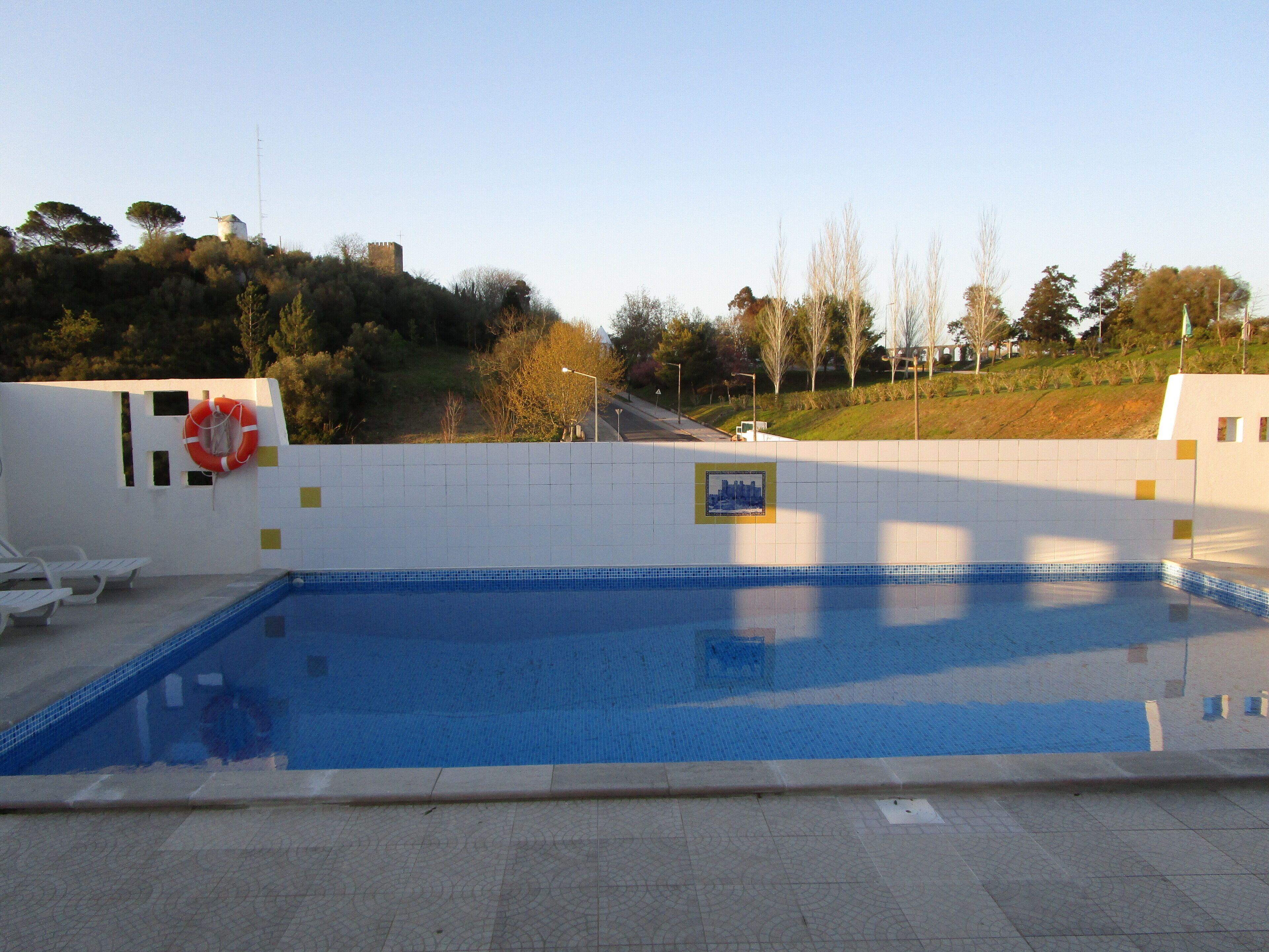 outdoor pool, pool loungers