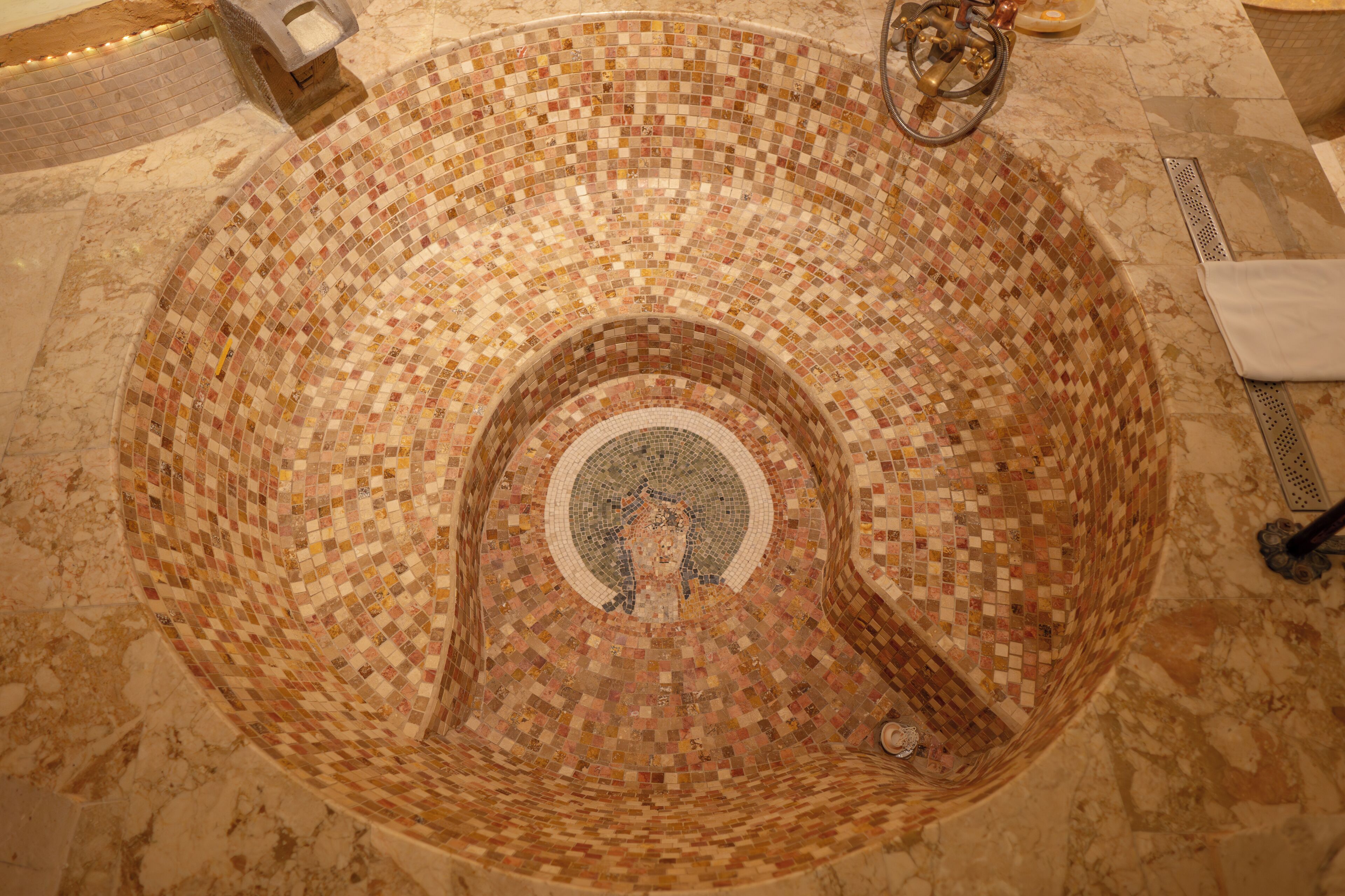 roman king suite with turkish hamam | bathroom | combined shower/bathtub, jetted bath, hydromassage showerhead