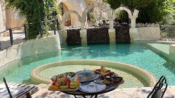 Outdoor pool, pool umbrellas, sun loungers