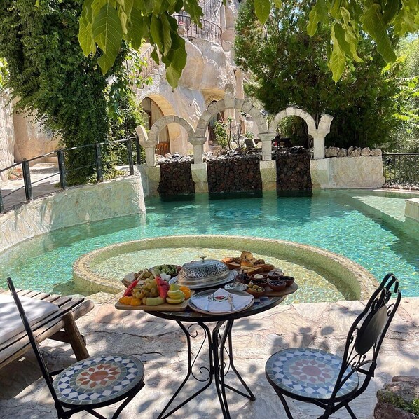 Outdoor pool, pool umbrellas, pool loungers