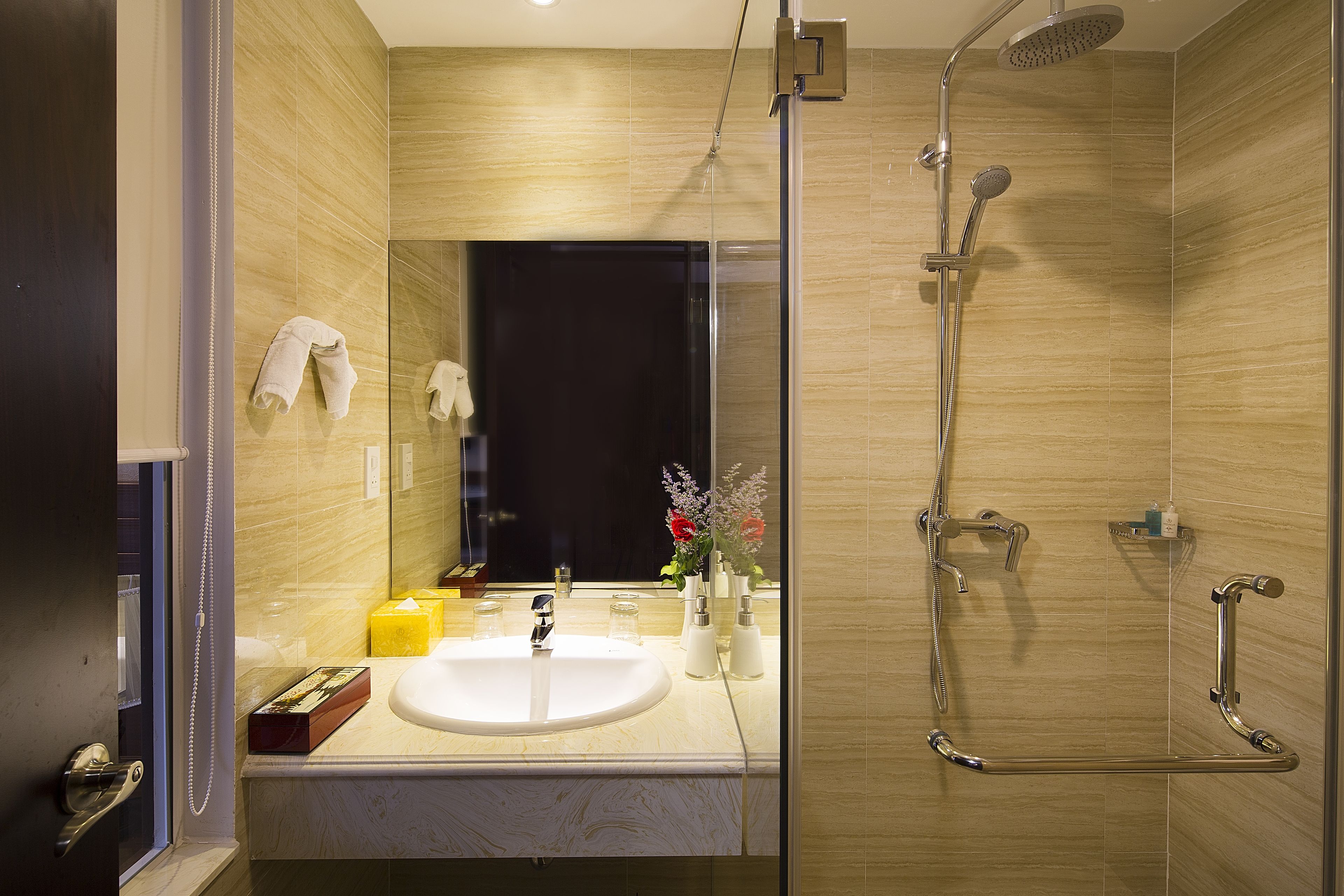 hair dryer, bathrobes, slippers, towels