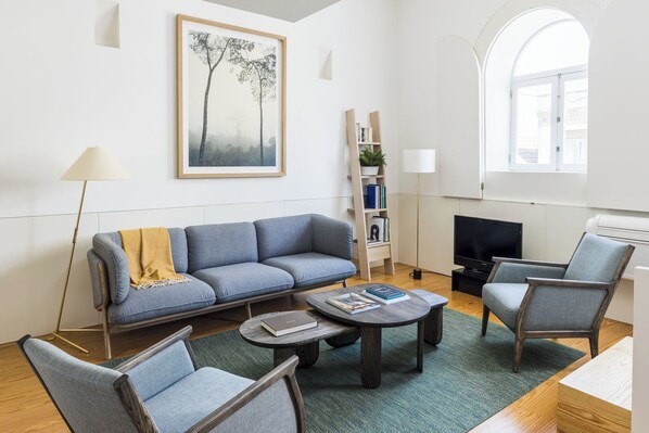 Apartment, 1 Bedroom, Kitchenette, City View | Living area | 50-inch flat-screen TV with cable channels, TV, DVD player