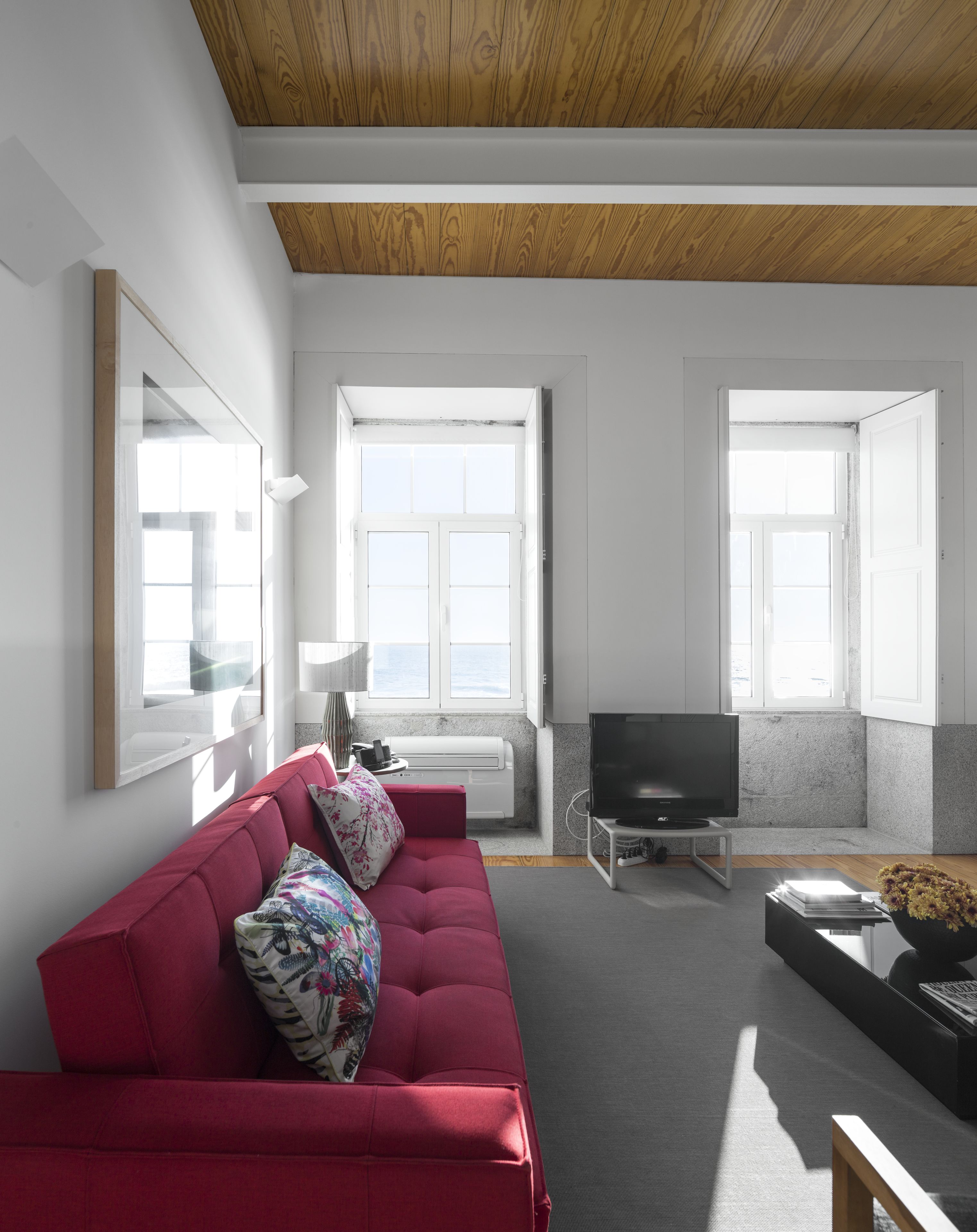 apartment, 1 bedroom, kitchenette, sea view | living area | 50-inch flat-screen tv with cable channels, tv, dvd player