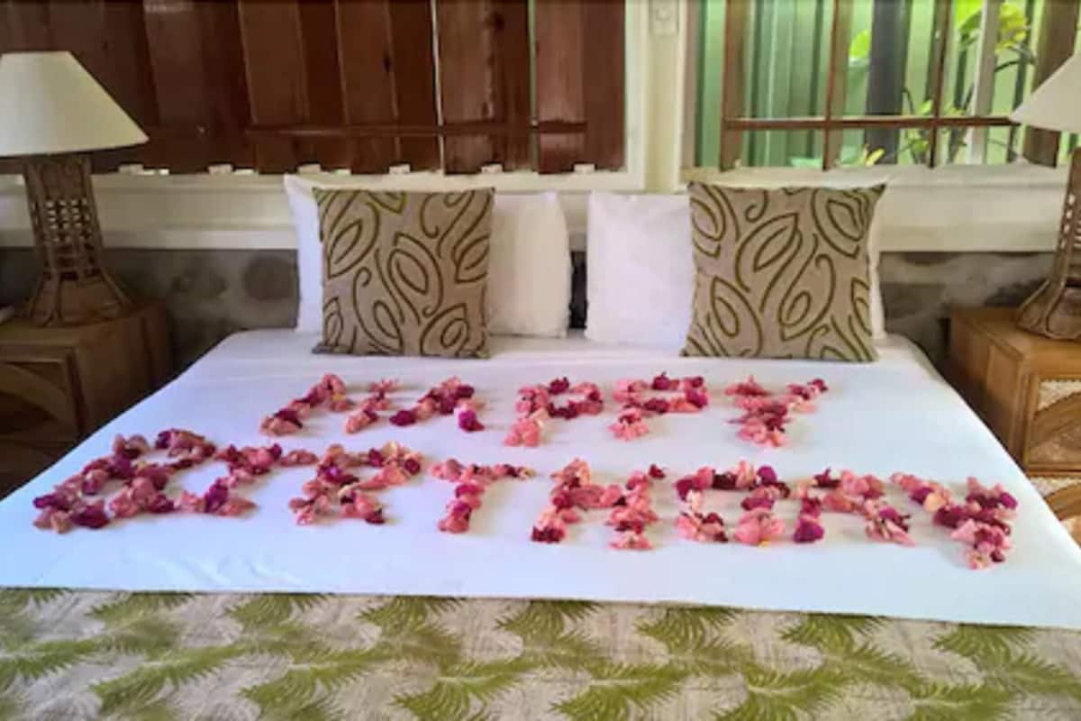 superior cottage, patio, sea view | in-room safe, desk, iron/ironing board, cots/infant beds