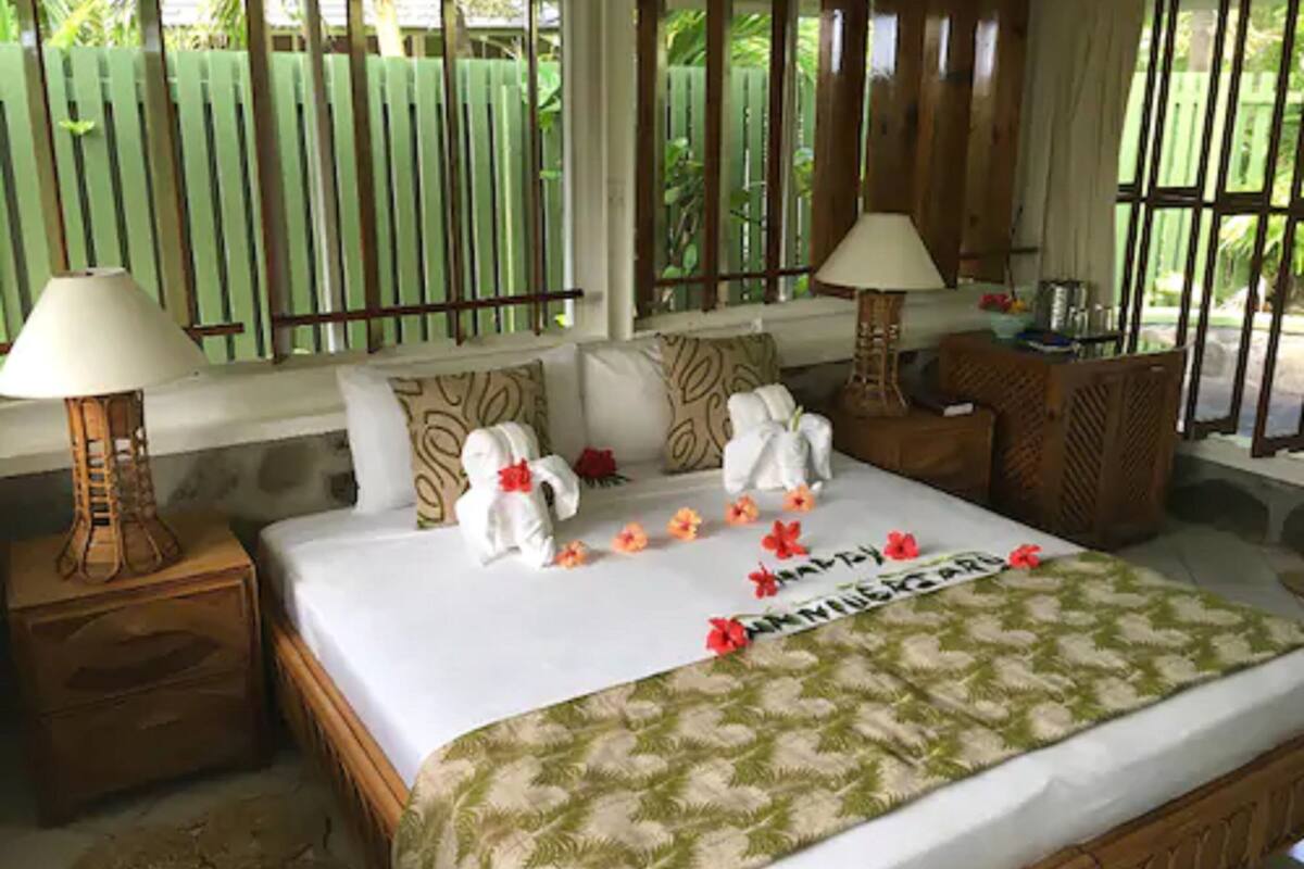 superior cottage, patio, sea view | in-room safe, desk, iron/ironing board, cots/infant beds