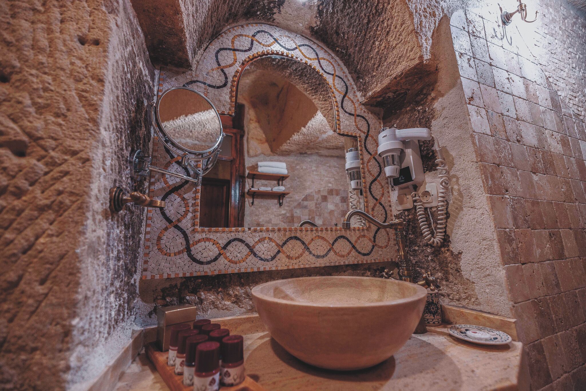 suite cave room | bathroom | free toiletries, hair dryer, slippers, towels