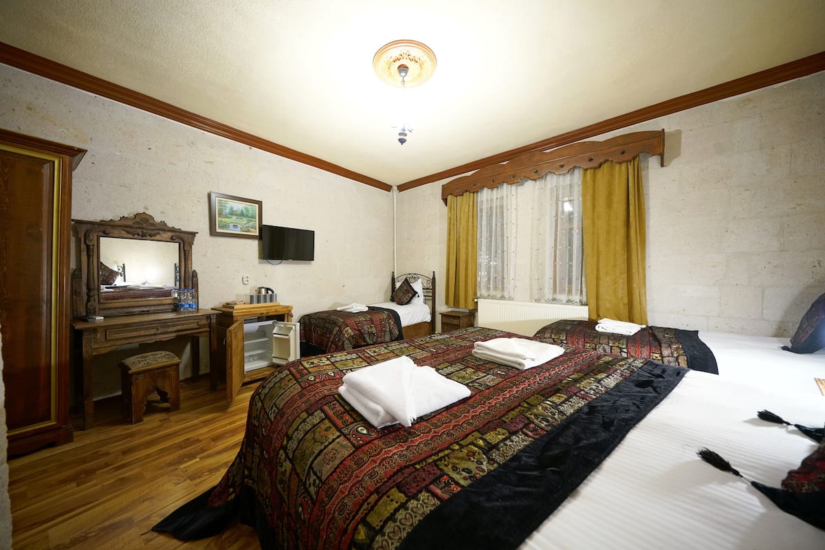 Standard Quadruple Room, 1 Bedroom | In-room safe, soundproofing, iron/ironing board, free WiFi