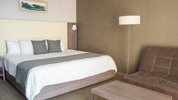 Habitación estándar, 1 cama King size | Caja de seguridad en la habitación, escritorio y cortinas blackout