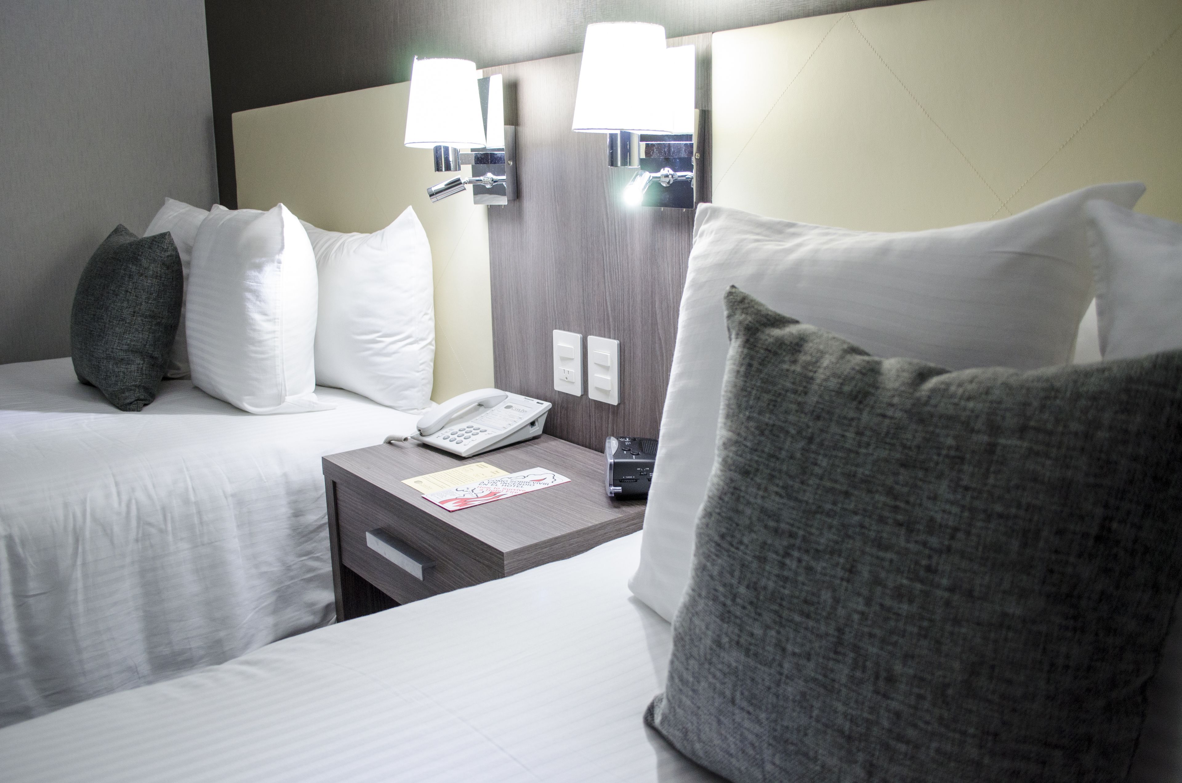 standard room, 2 double beds | 1 bedroom, in-room safe, desk, blackout curtains