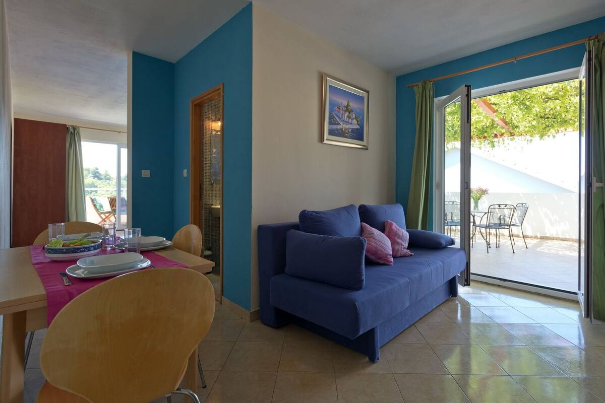 Apartment, 1 Bedroom, Terrace, Sea View (Sea) | Living area | Flat-screen TV, DVD player