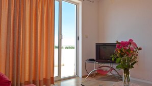 Apartment, 1 Bedroom, Terrace, Sea View (Sunset) | Living room