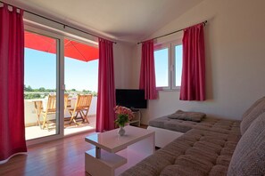 Apartment, 2 Bedrooms, Terrace, Sea View (Stars) | Living room | Flat-screen TV, DVD player