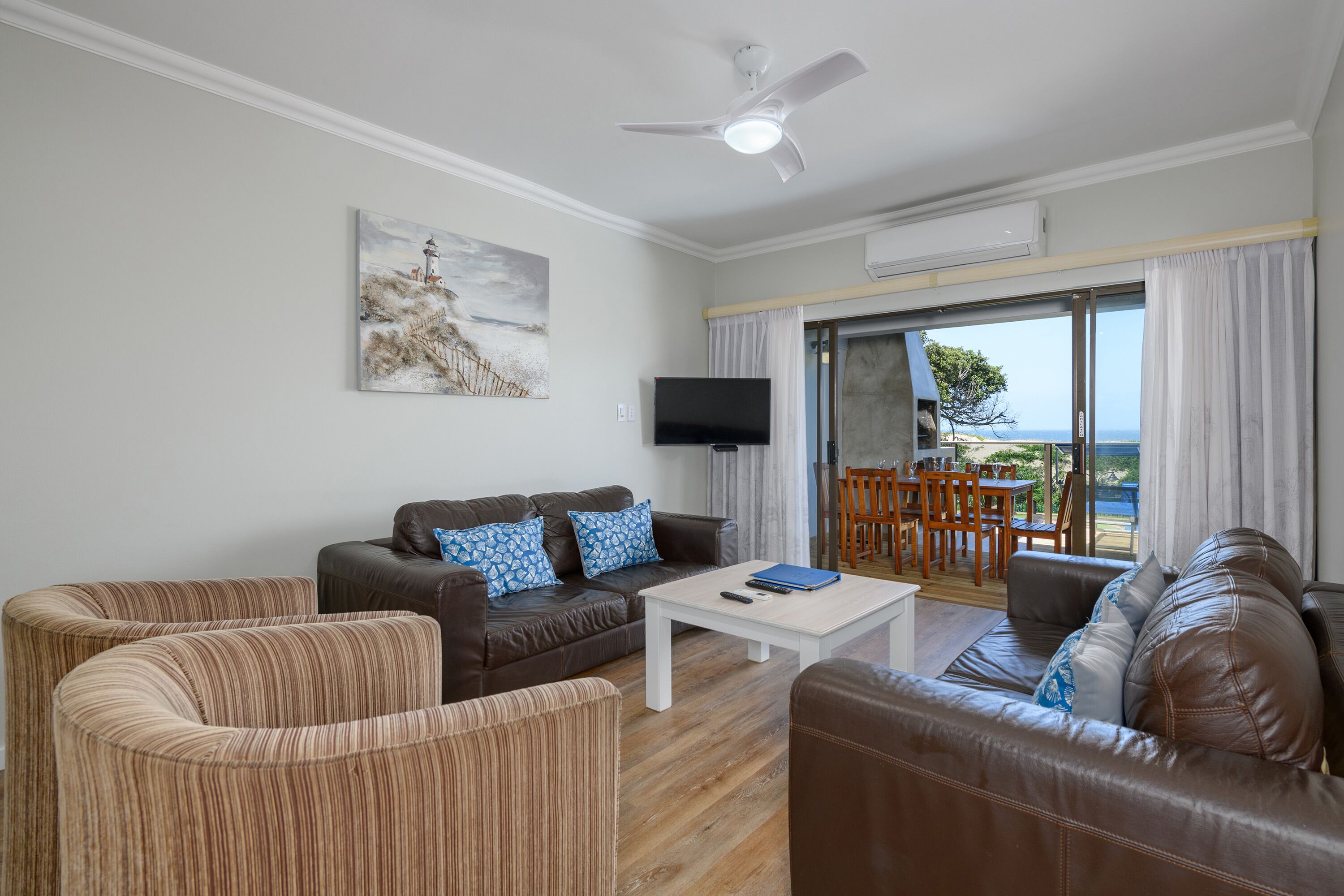 Three Bedroom Luxury Apartment with Splash Pool | Living area | Flat-screen TV