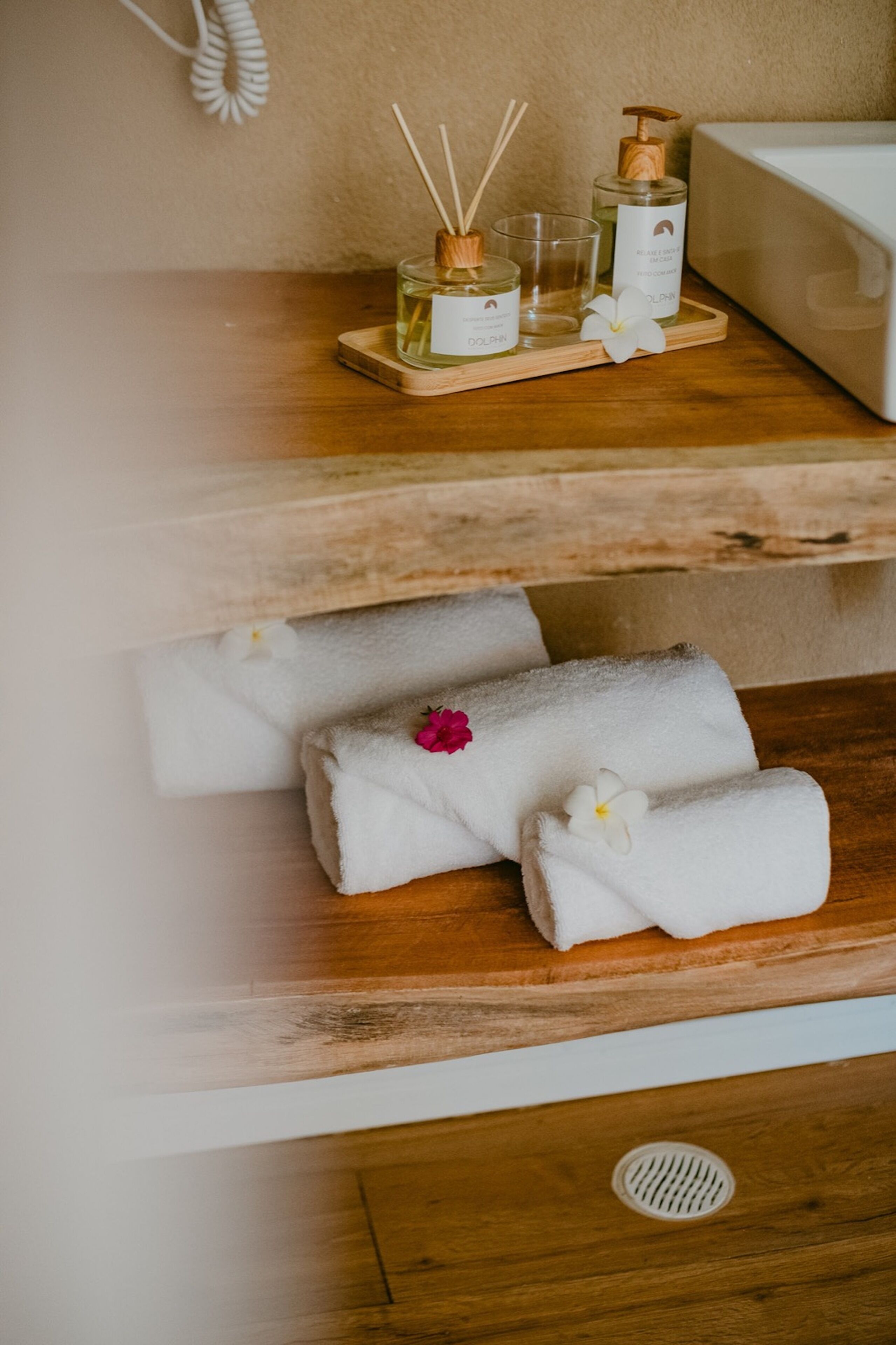 shower, designer toiletries, hair dryer, towels