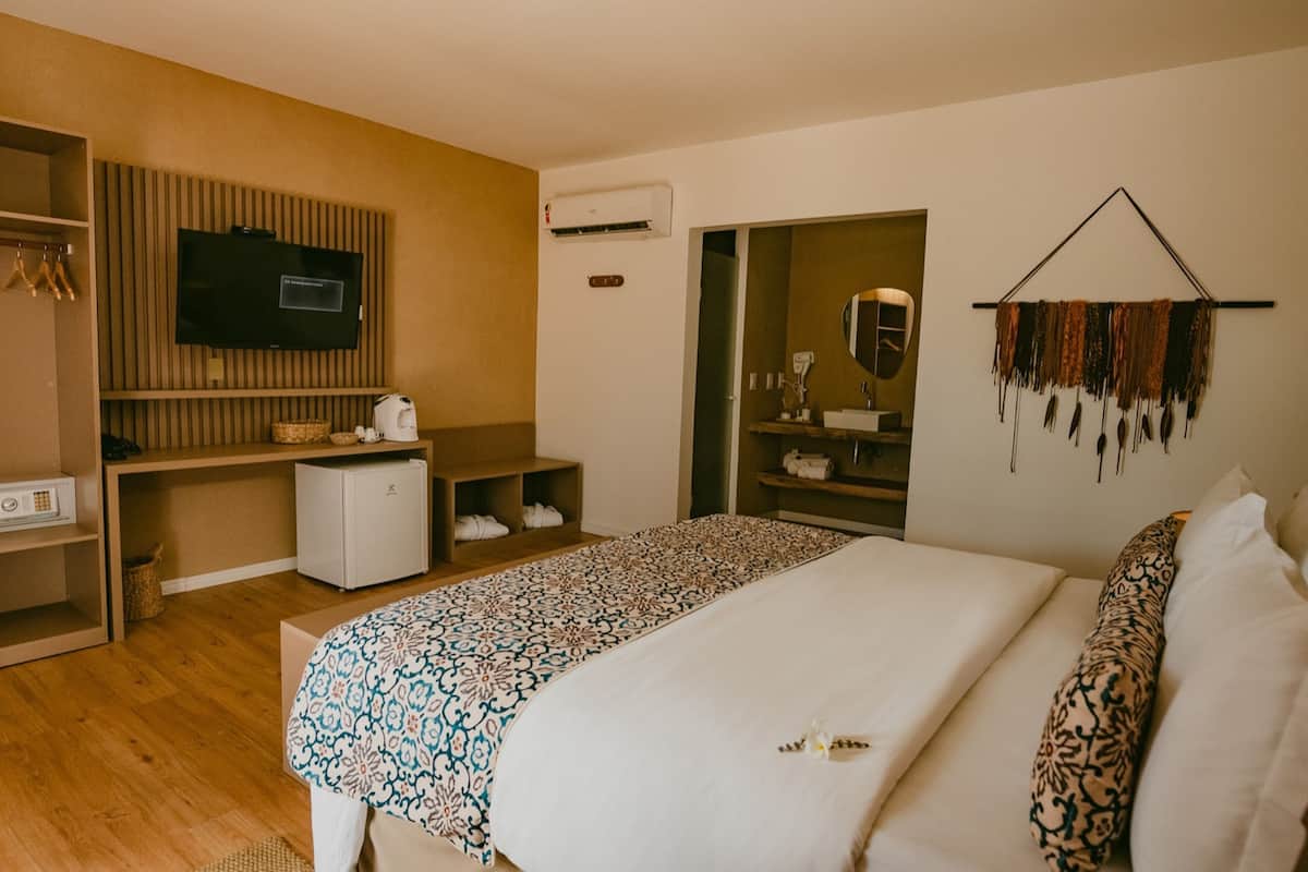 Villa | Luxe beddengoed, een minibar, een kluis op de kamer