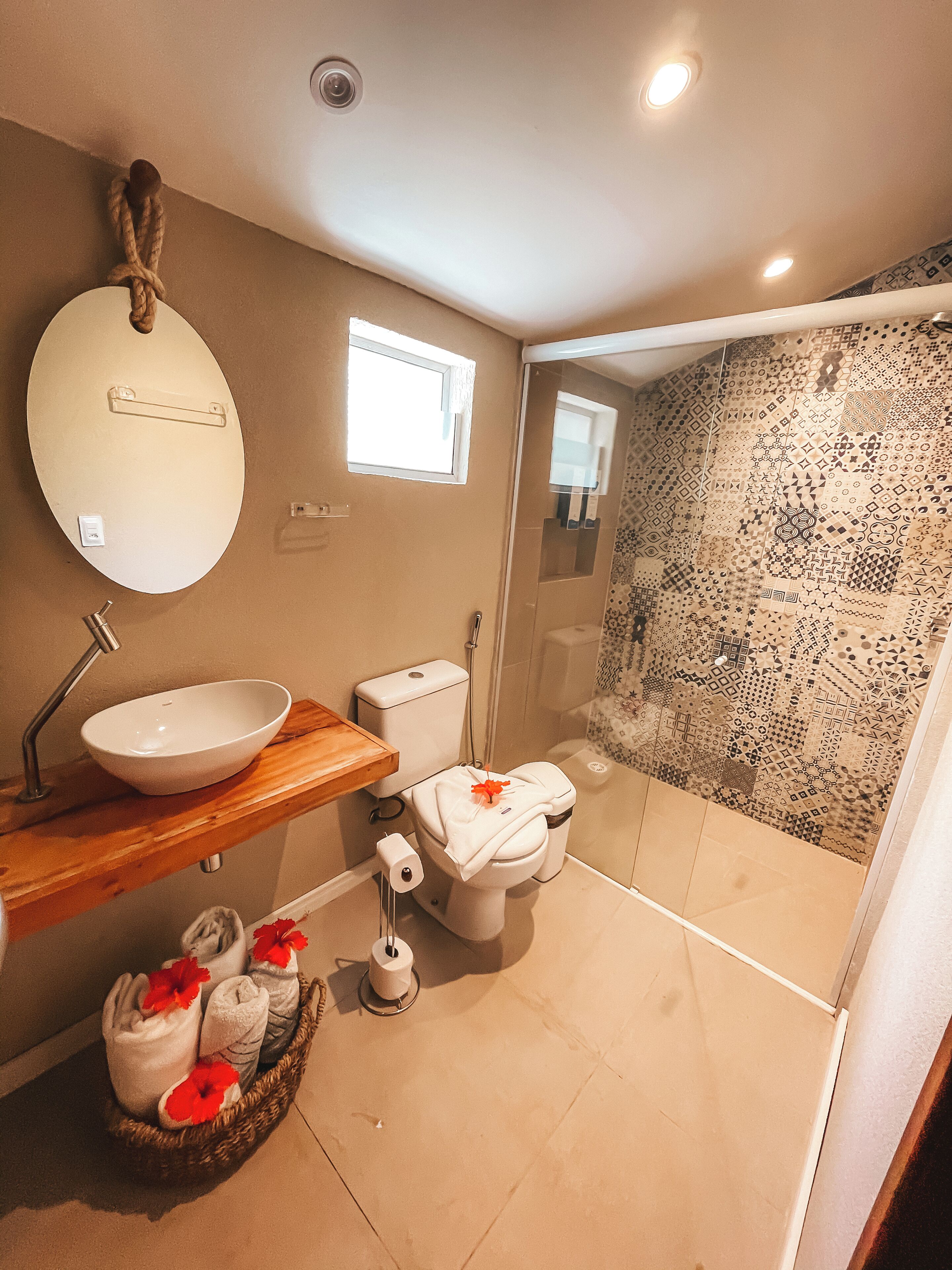 villa standard | bathroom | shower, designer toiletries, hair dryer, towels